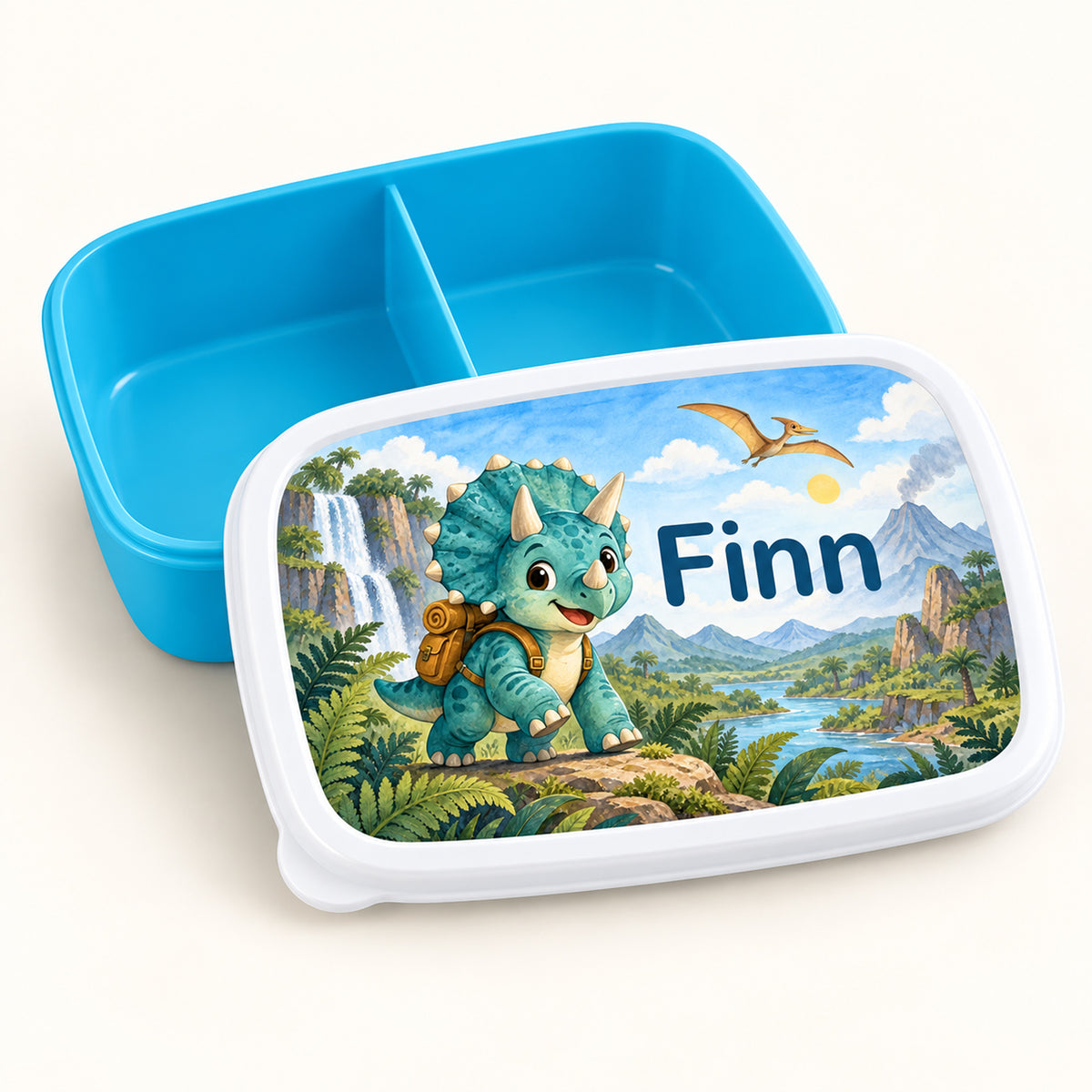 Personalisierte blaue Brotdose Dino-Entdecker mit Beispielname Finn: Deckel und Innenaufteilung