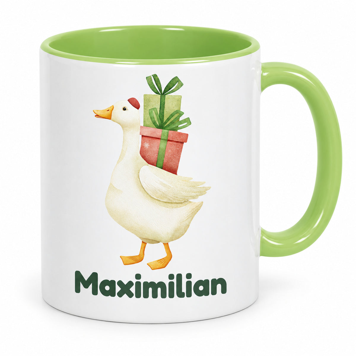 Hellgrüne Tasse mit Gans mit Geschenken und Beispielname Maximilian in der Vorderansicht