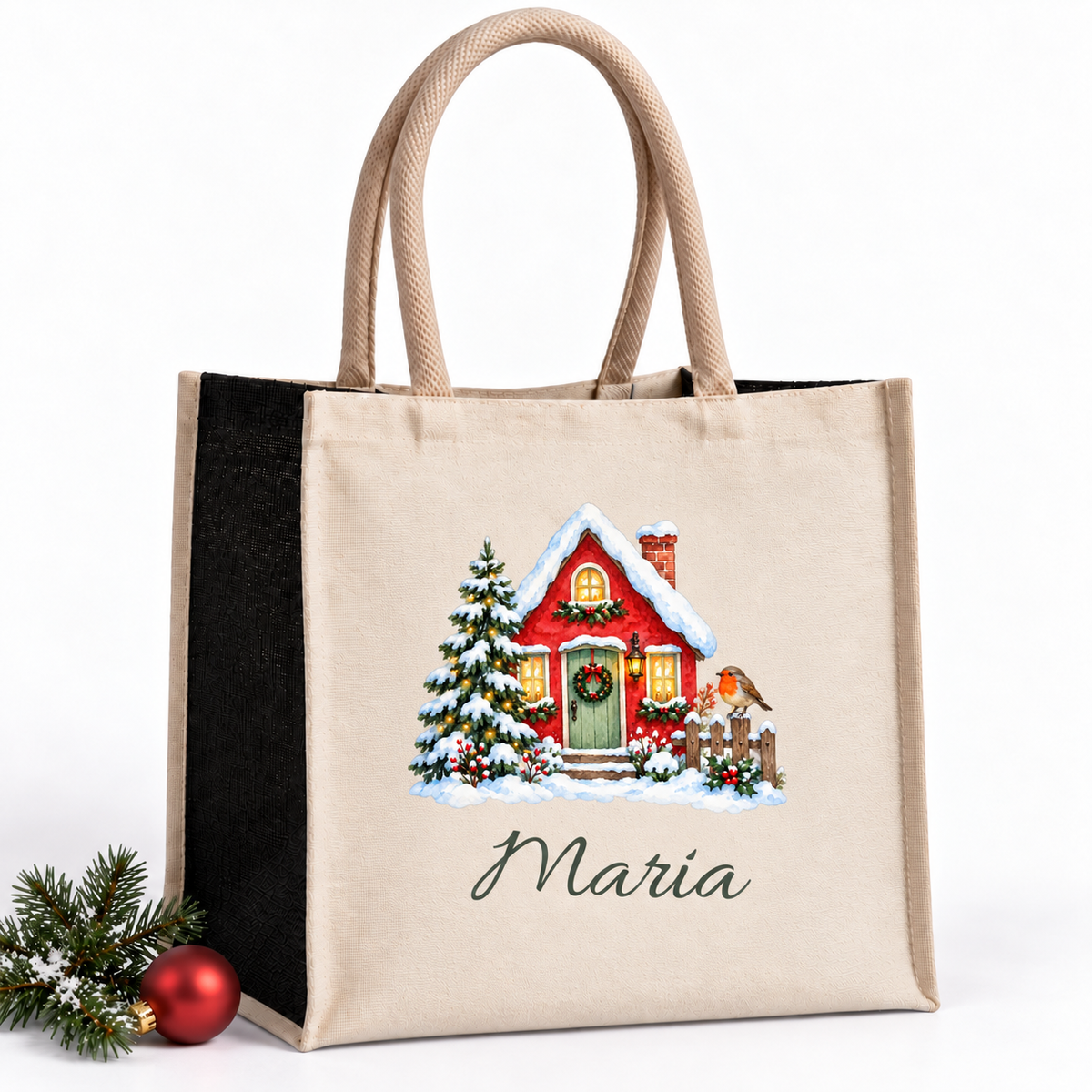 Naturfarbene Tasche mit schwarzen Seiten, Motiv Winterhäuschen mit Rotkehlchen und personalisiertem Wunschnamen.