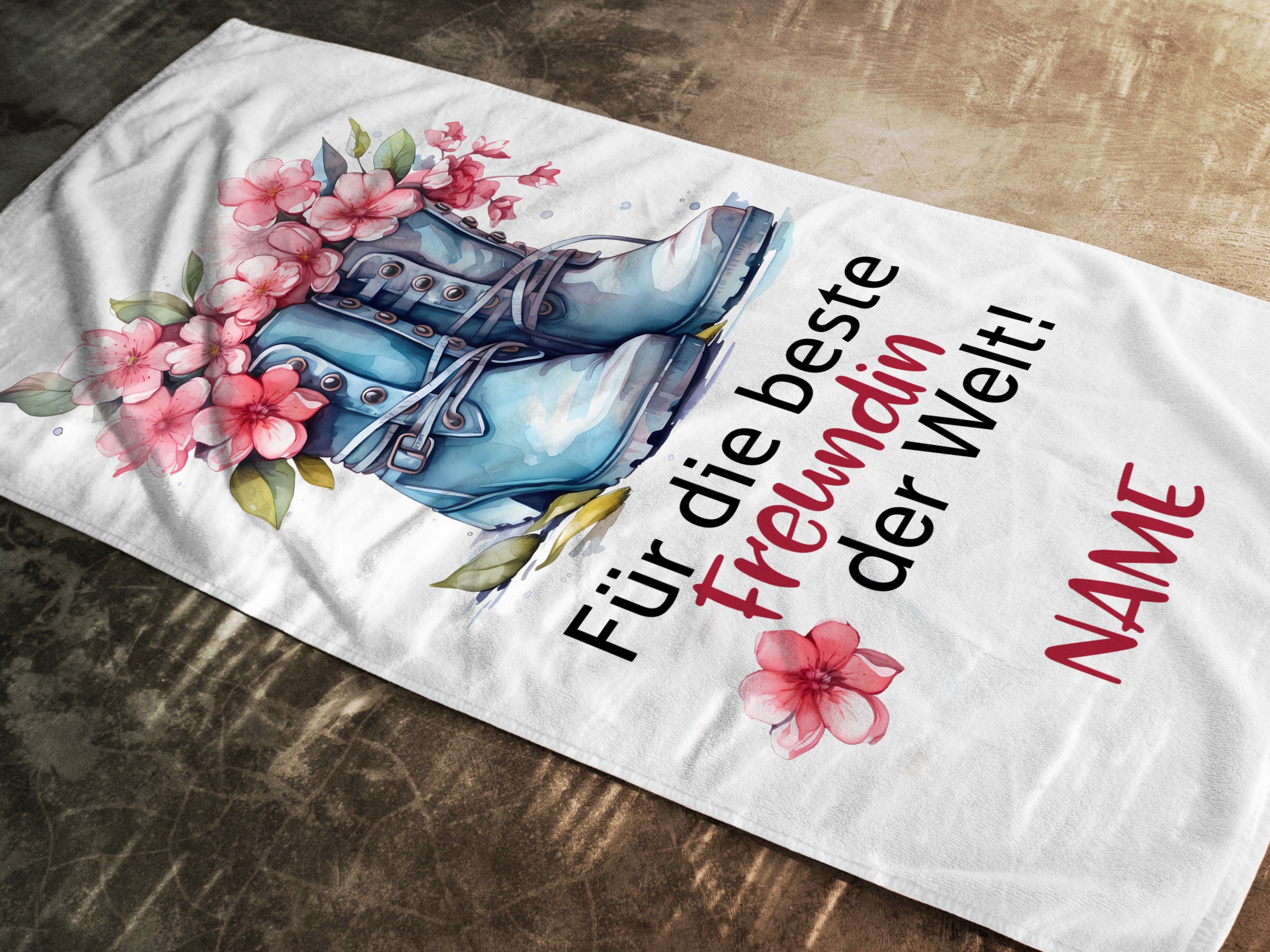 Handtuch mit Blumen und Stiefeln