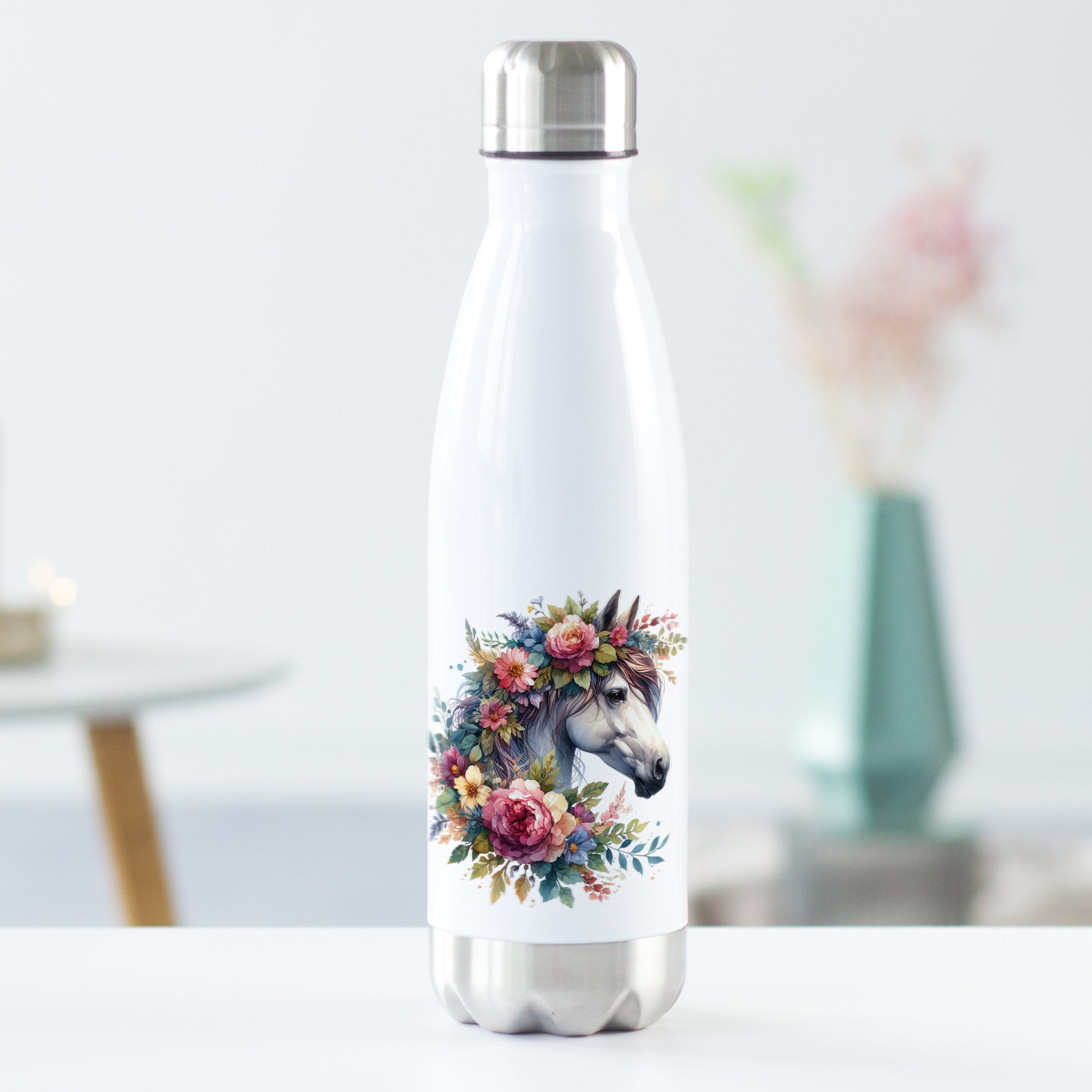 Weiße Edelstahl-Trinkflasche mit Einhorn und Blumenmotiv.