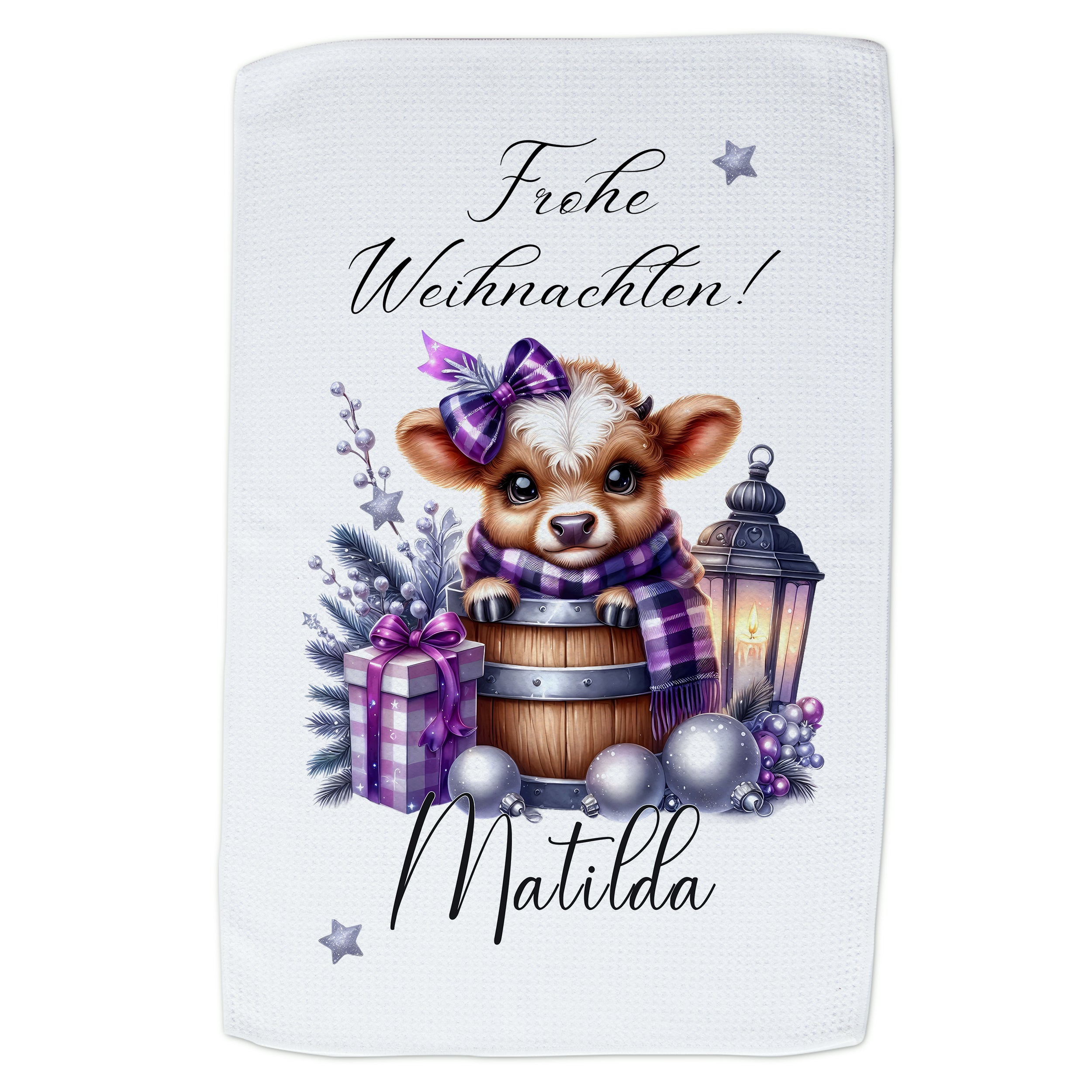 Weihnachtliches Handtuch mit Kälbchen und Geschenken.