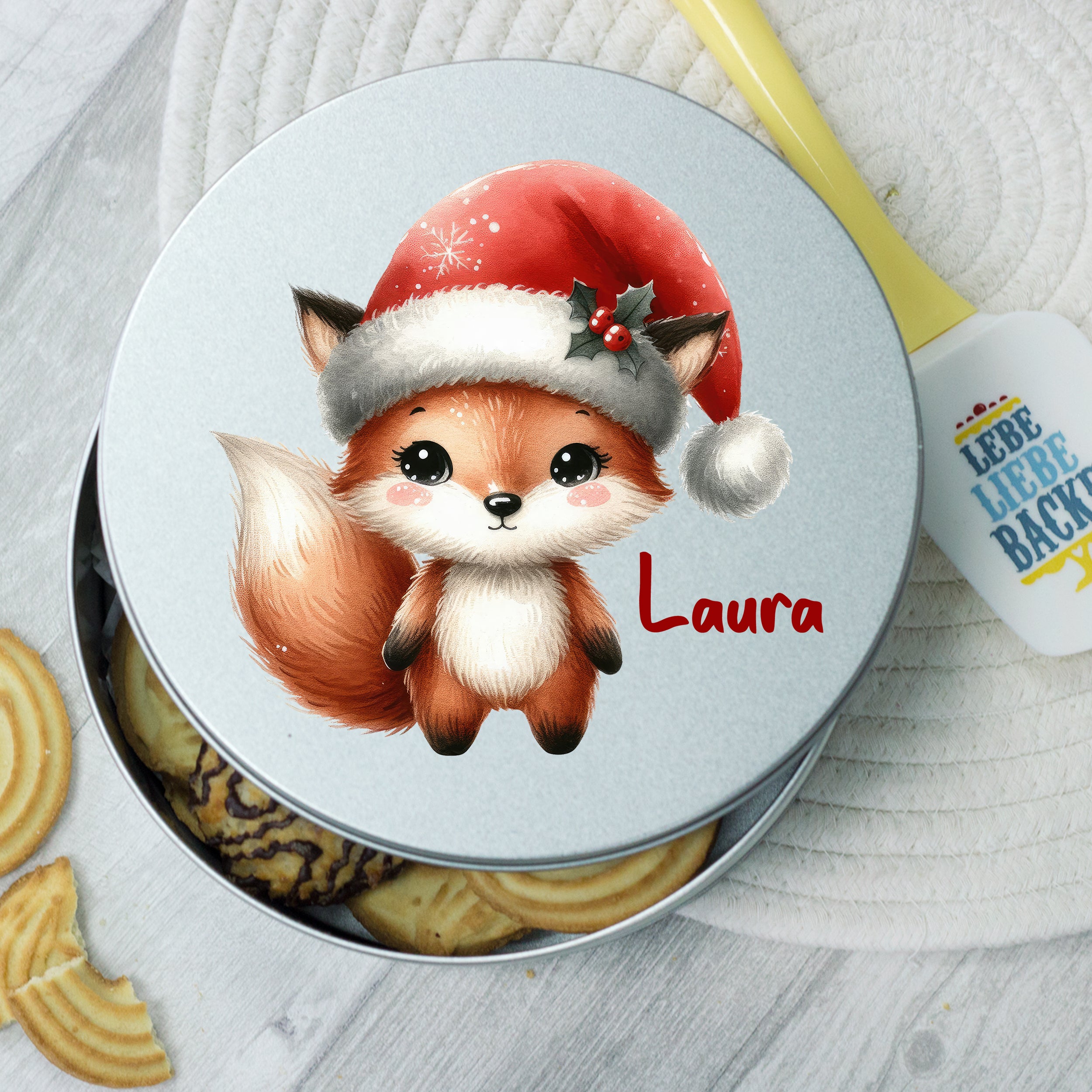 Kekse Dose mit niedlichem Fuchs und rotem Weihnachtsmütze.