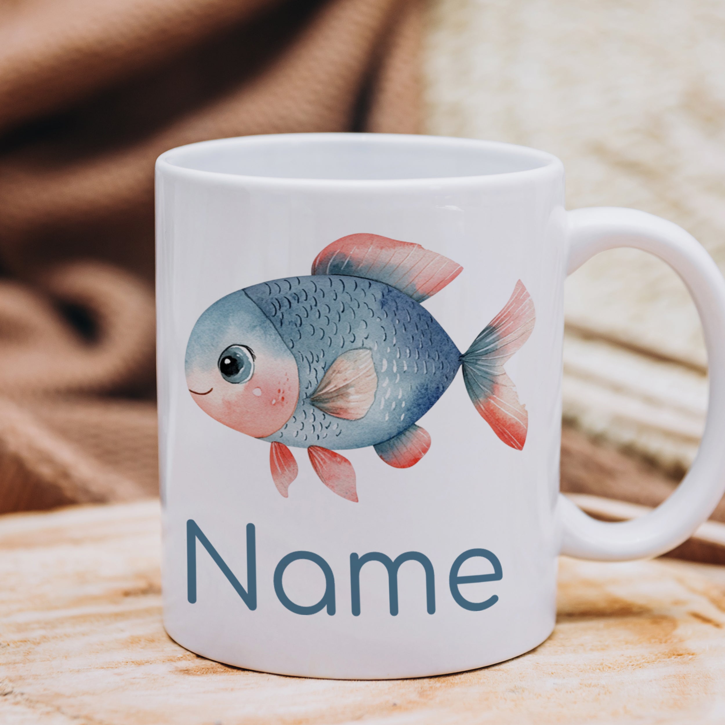 Tasse mit Fischmotiv
