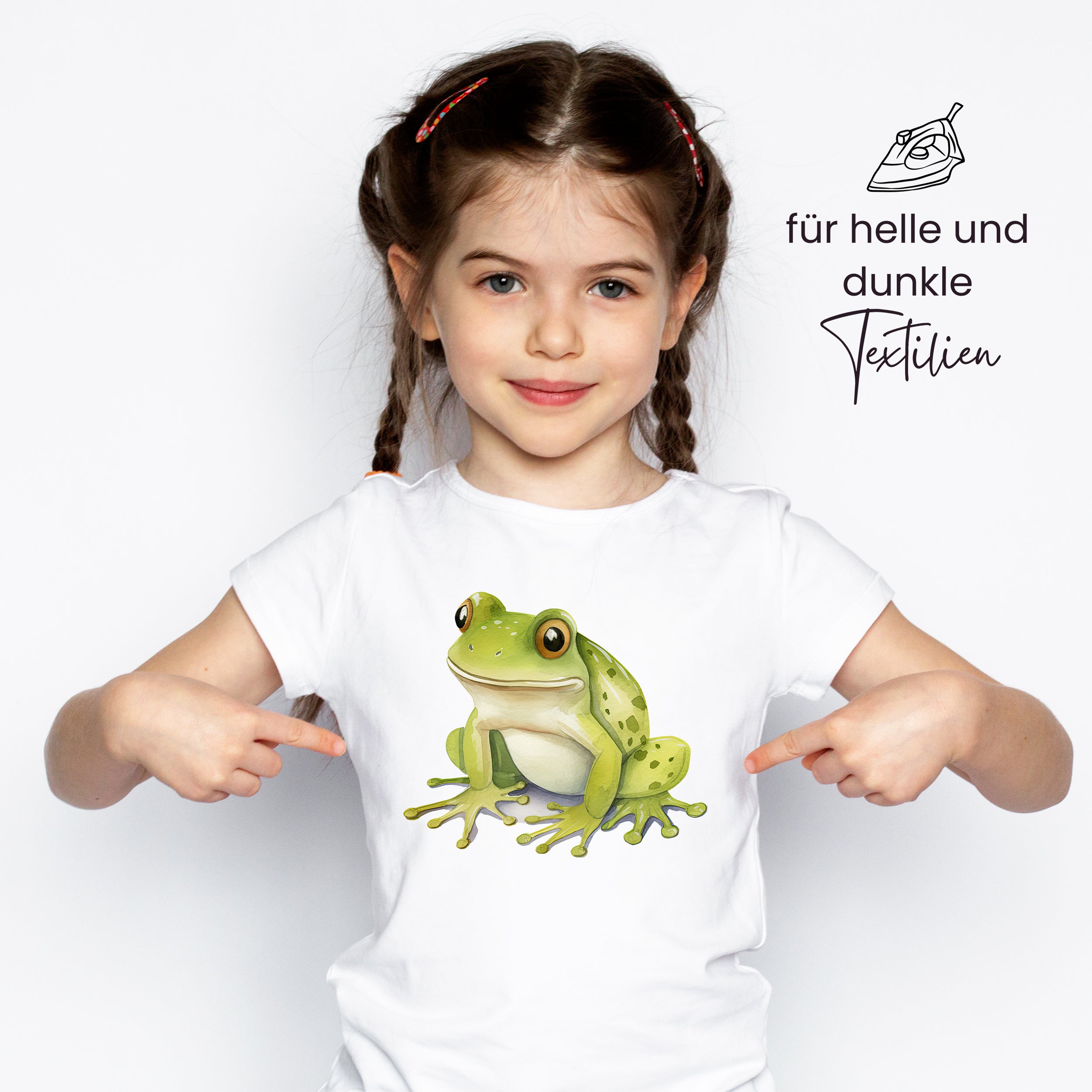Weißes T-Shirt mit grünem Frosch-Motiv, kindgerecht.