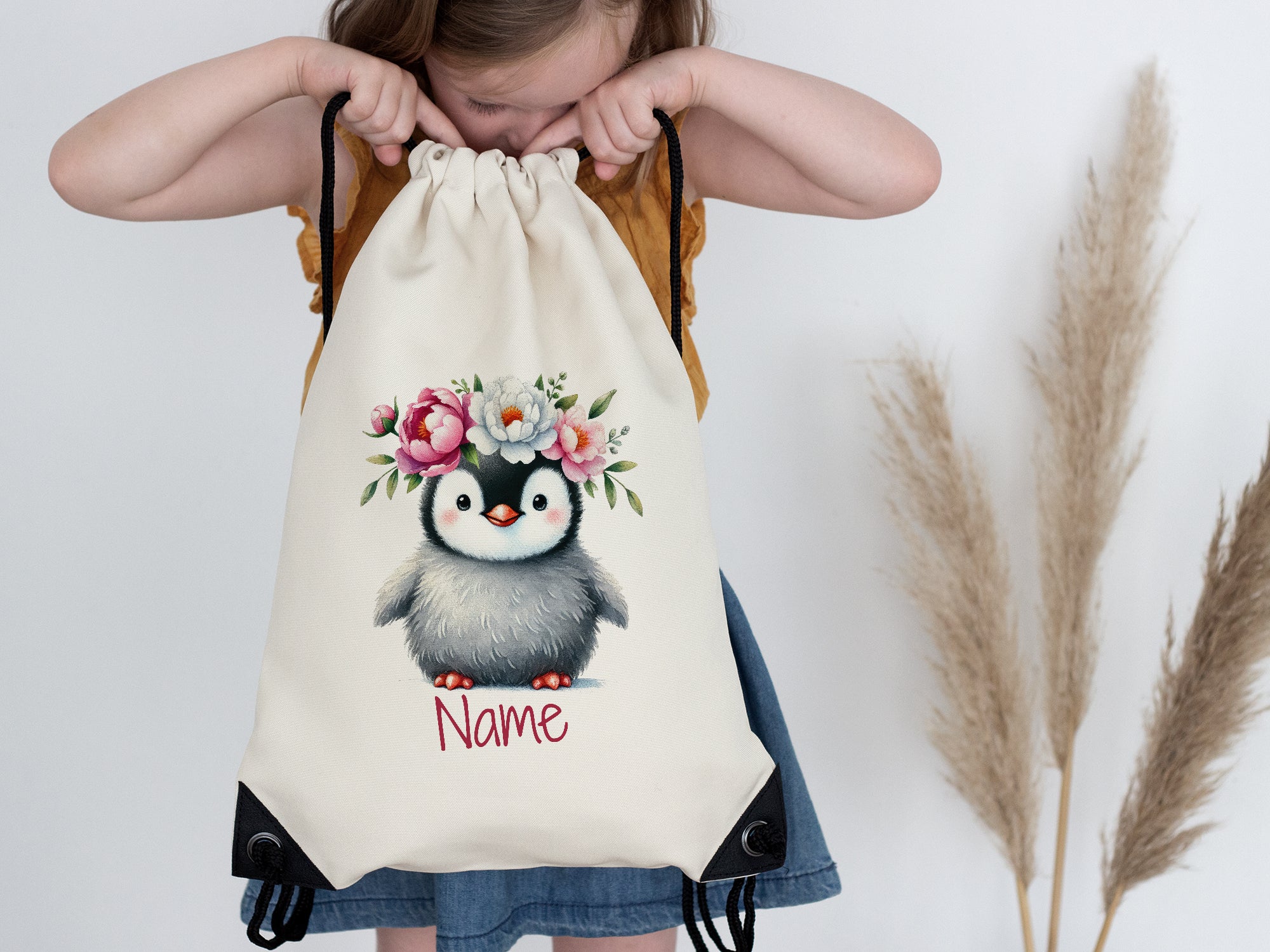 Turnbeutel mit Pinguin und Blumen