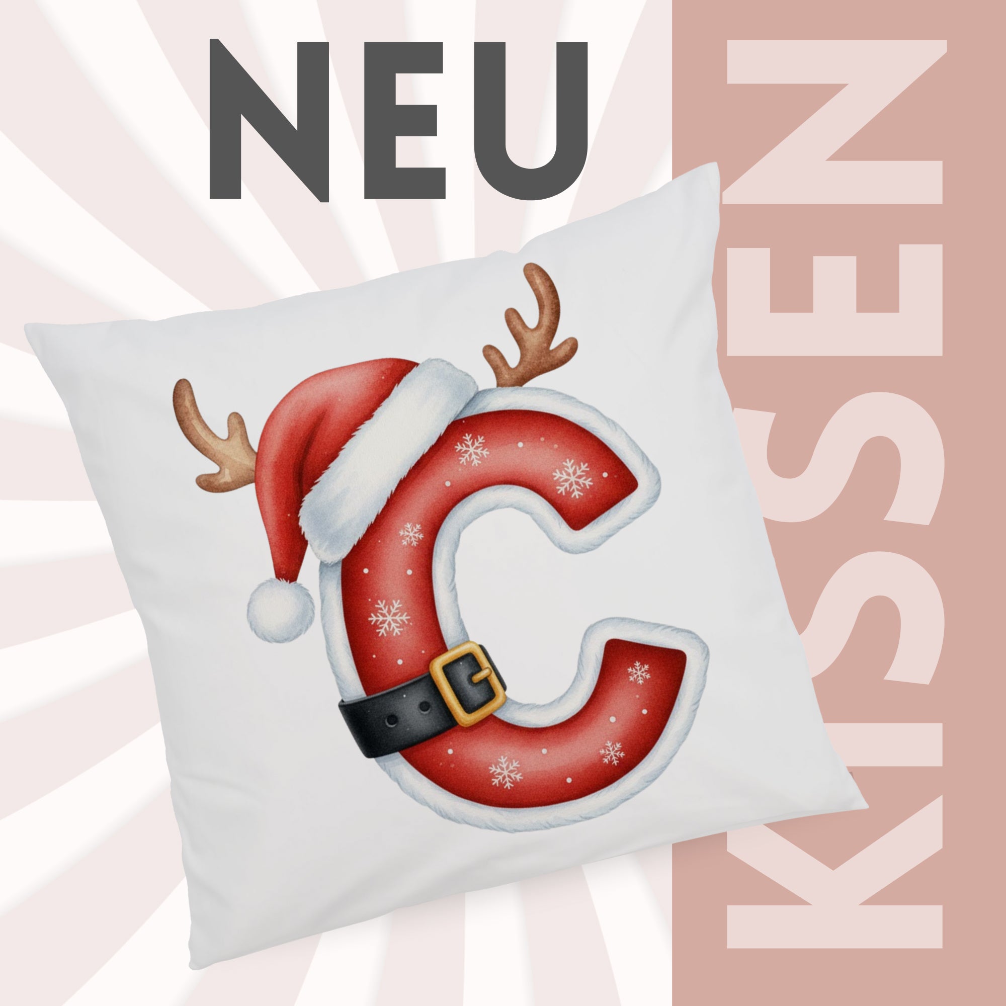 Kissen mit rotem Weihnachtsbuchstaben C und Dekoration.