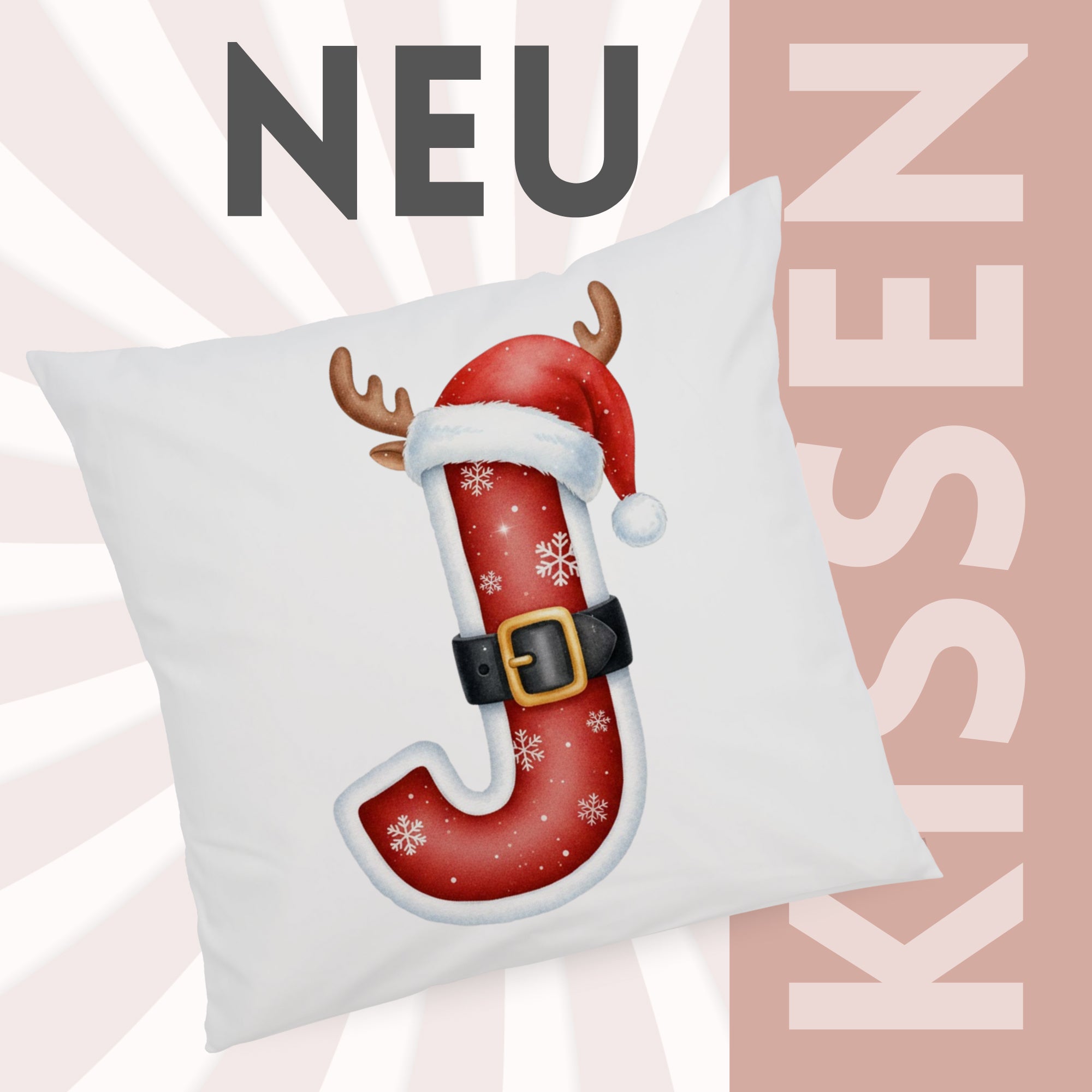 Kissen mit rotem Weihnachtsbuchstaben J und Schneeflocken.