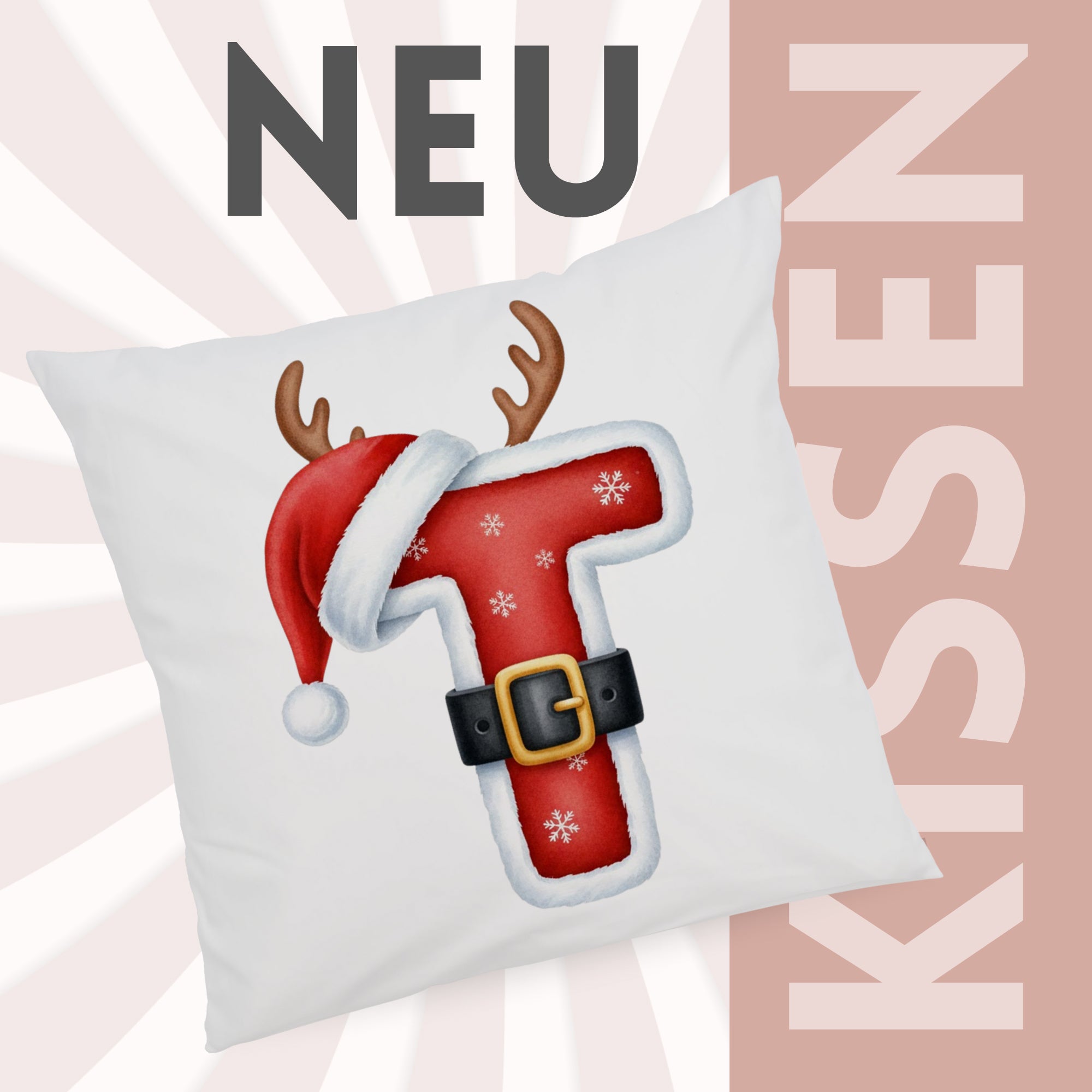 Weißes Kissen mit rotem Weihnachtsbuchstaben T und Rentiergeweih.