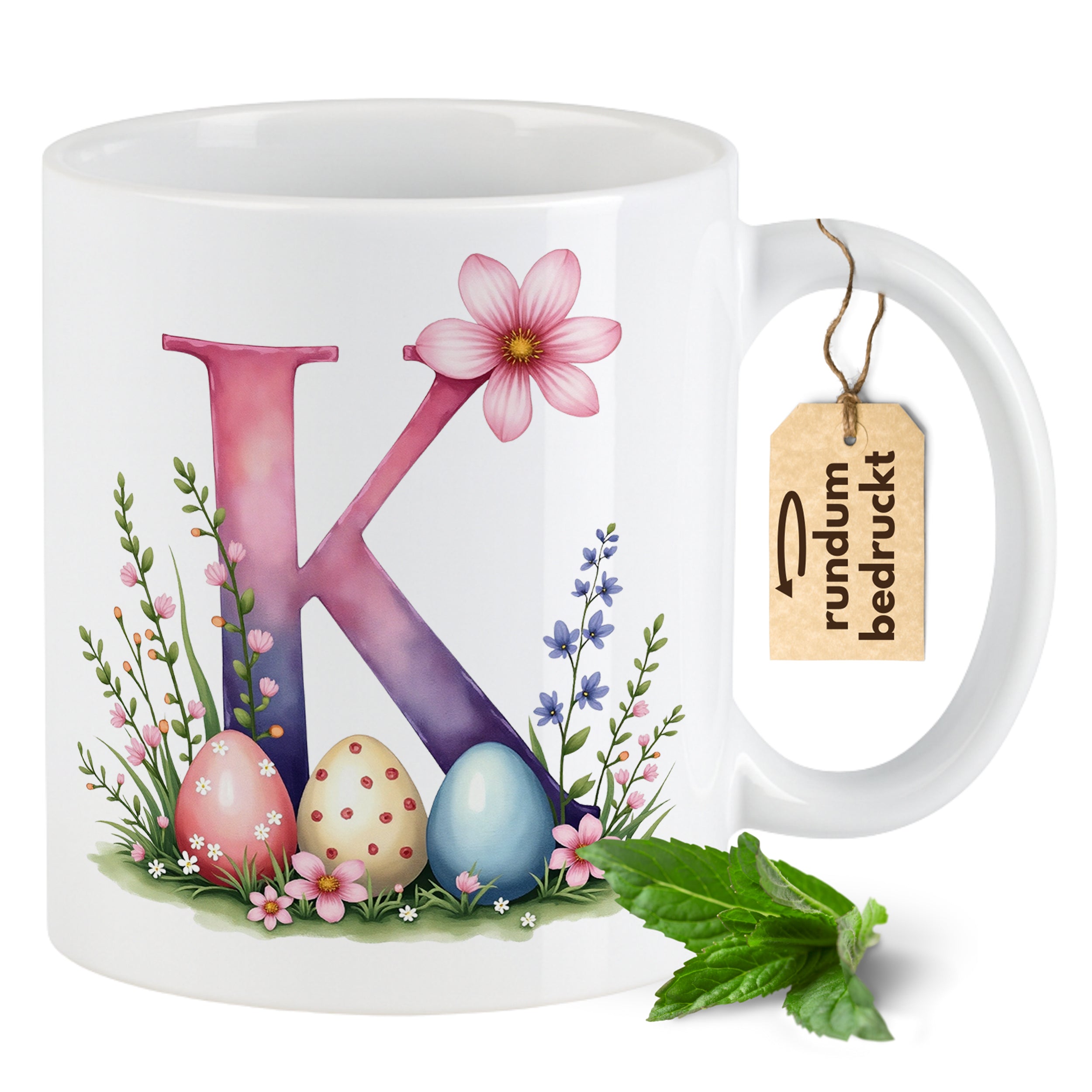 Kaffeetasse mit buntem K, Blumen und Ostereiern.