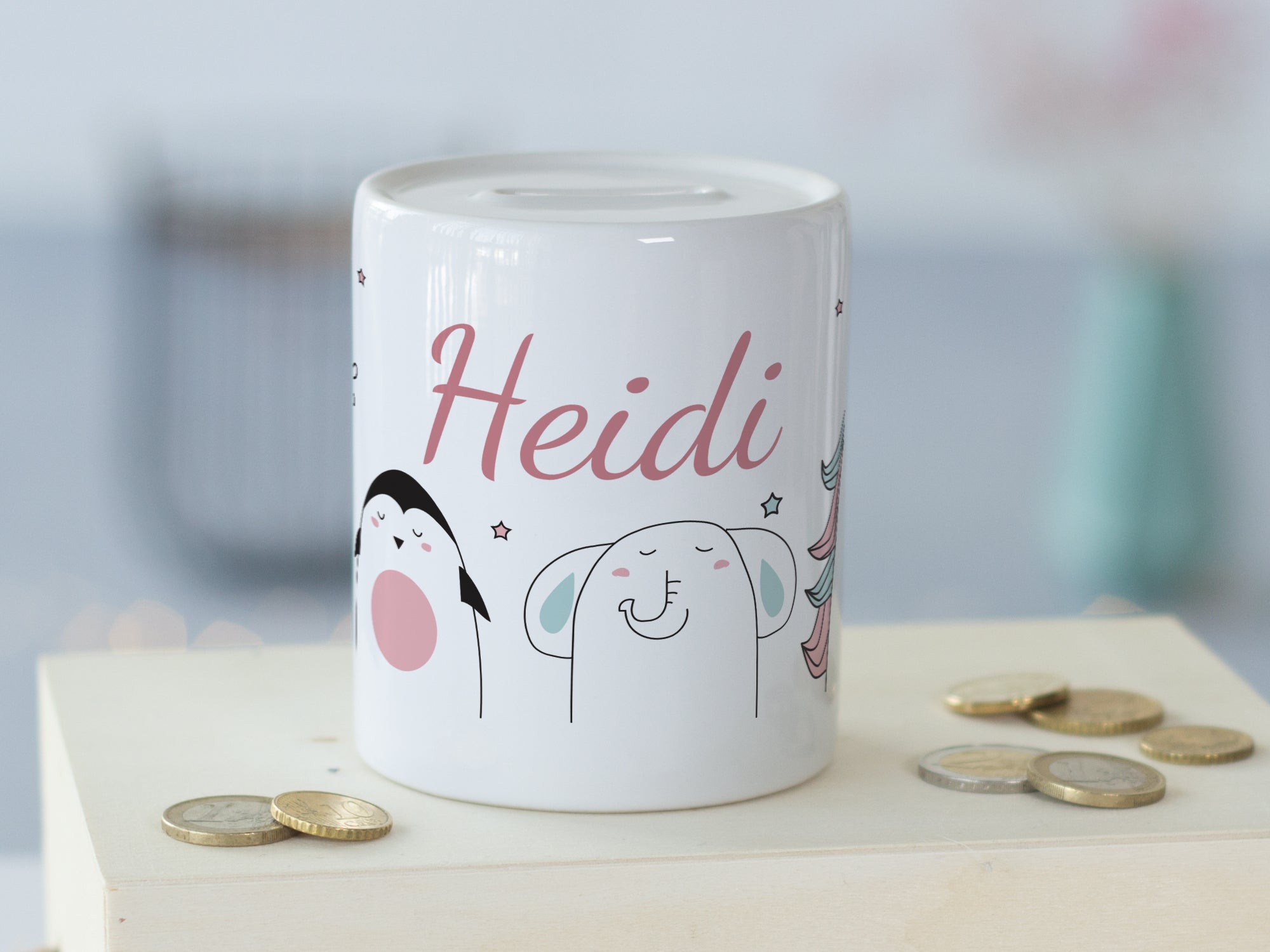 Spardose mit fröhlichen Tieren