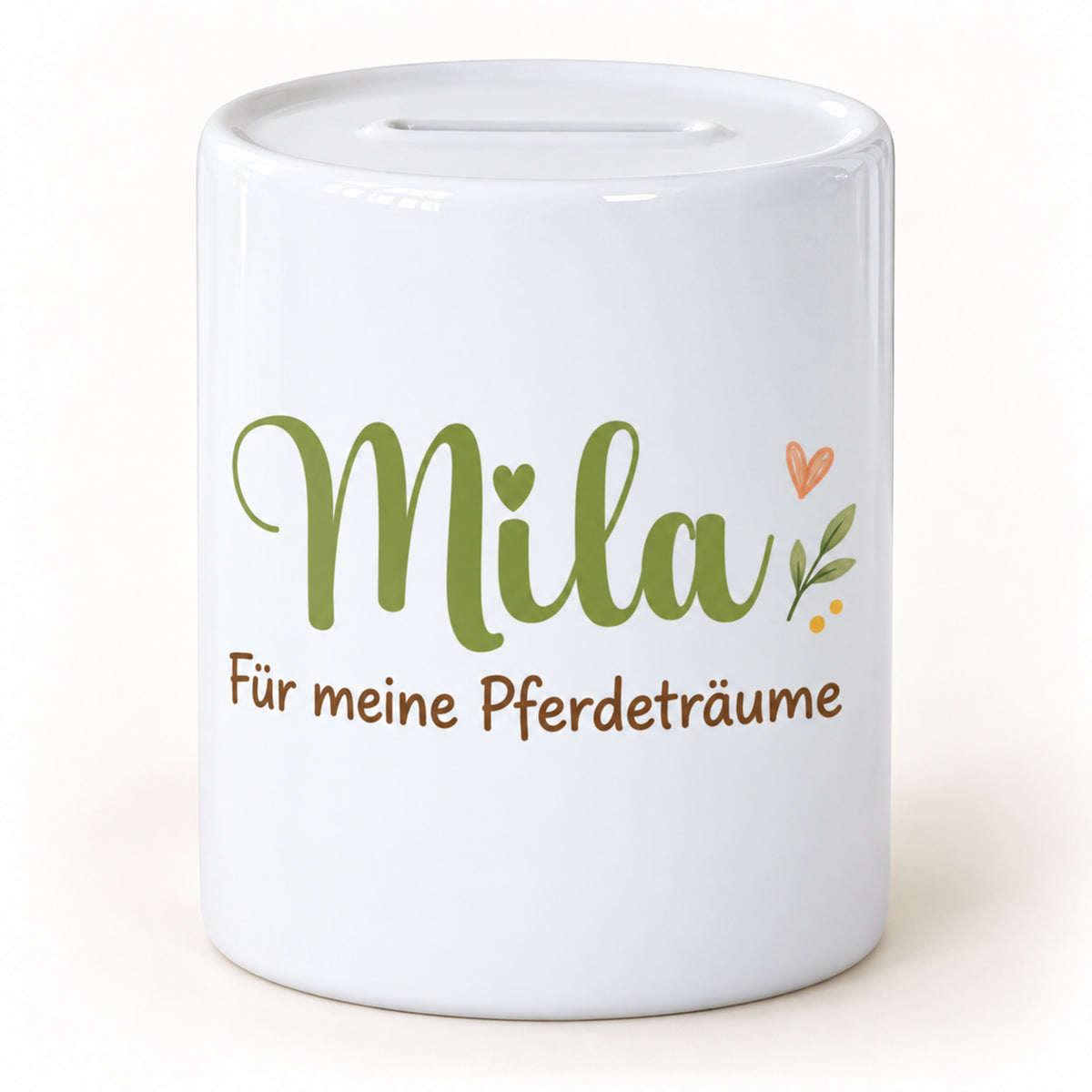 Namensseite der Spardose Blumenpony mit Beispielname Mila und dem Spruch „Für meine Pferdeträume“.