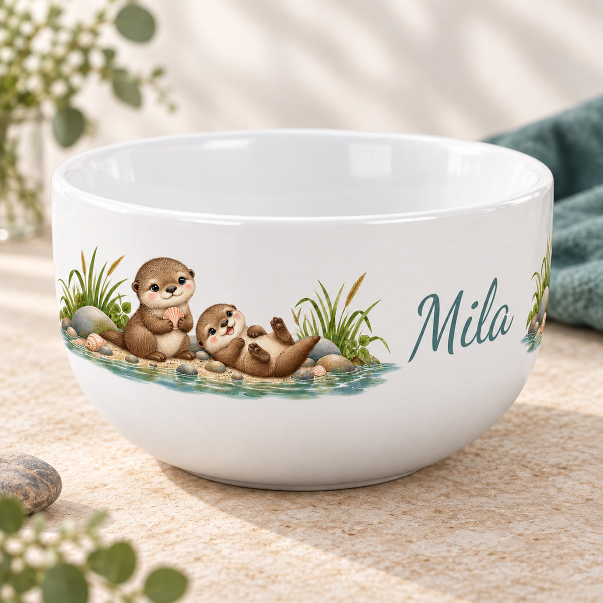 Seitliche Ansicht des bedruckten Motivs – Müslischale Otter Muschelglück, Beispielname Mila