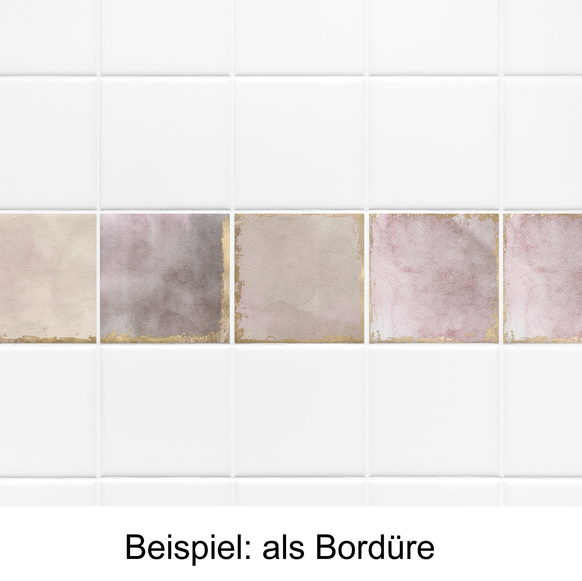 Fliesenbordüre in sanften Rosa- und Grautönen mit goldenen Akzenten.