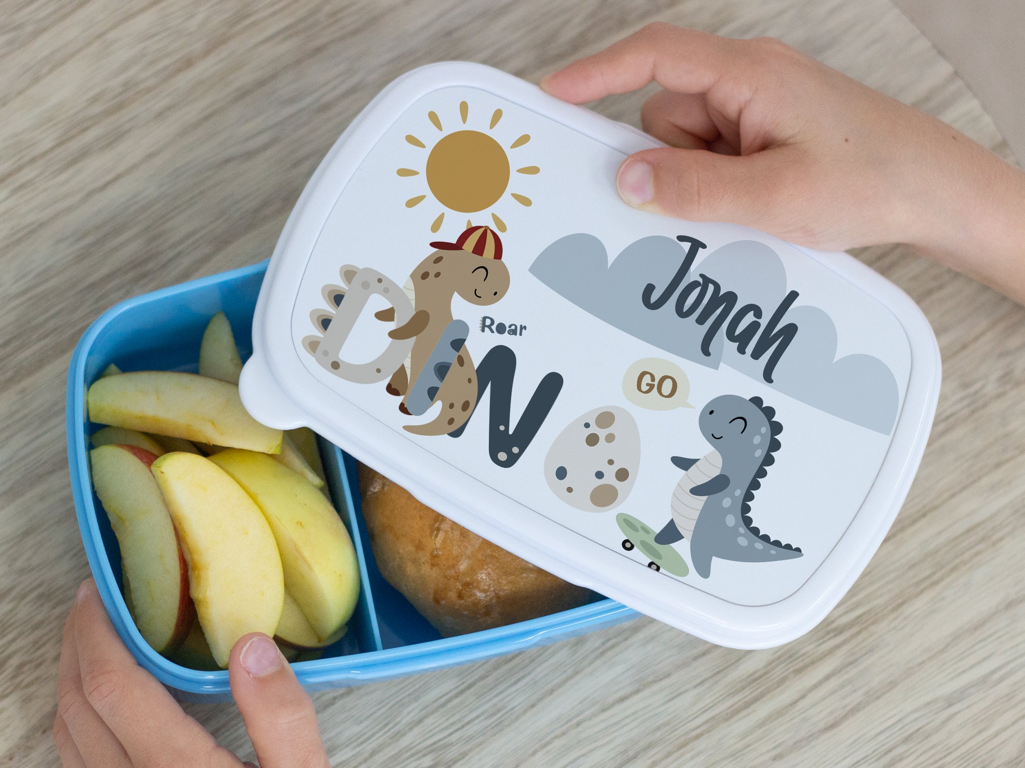 Brotdose blau mit Dinosaurier-Motiv