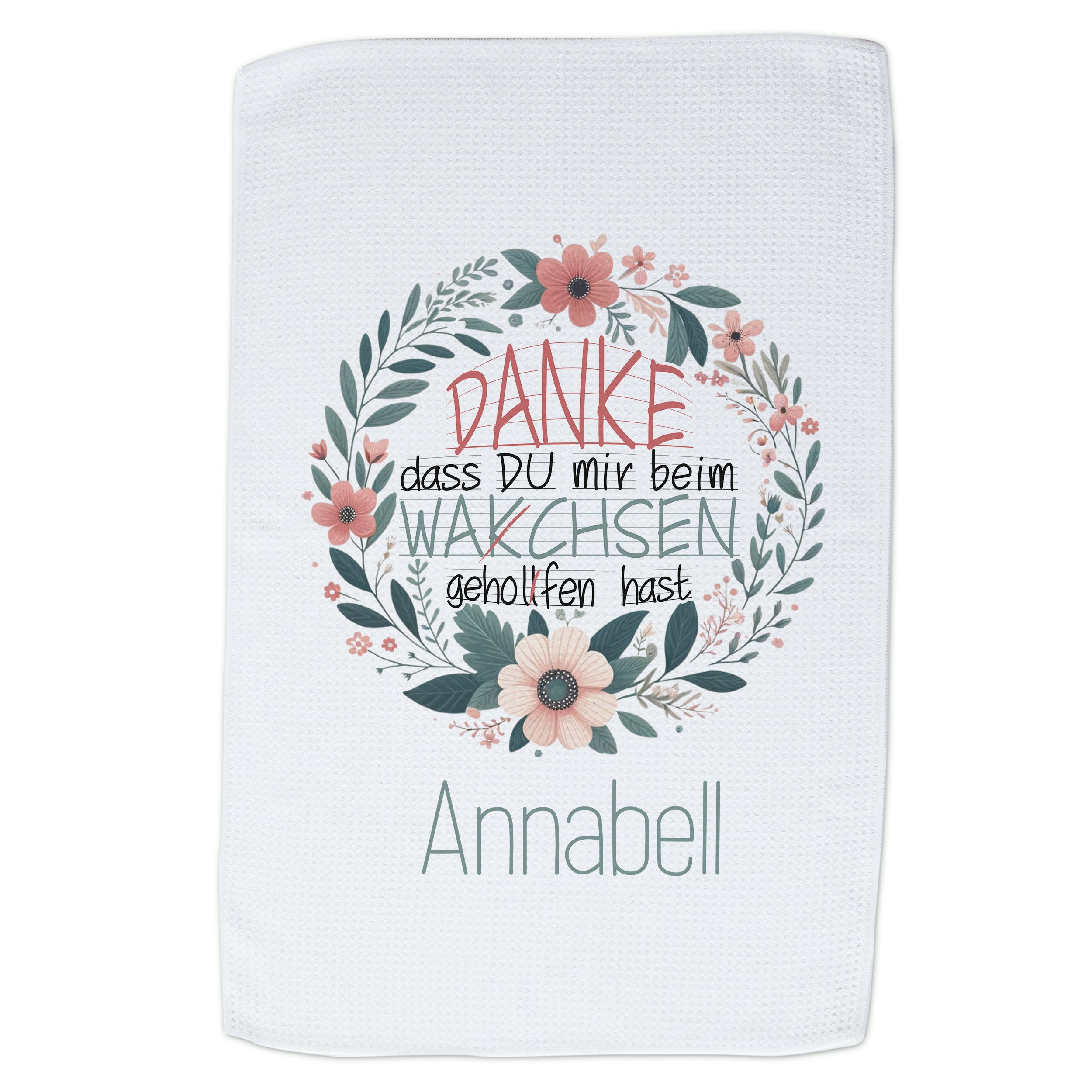 Weißes Handtuch mit floralem Design und Dankesbotschaft.