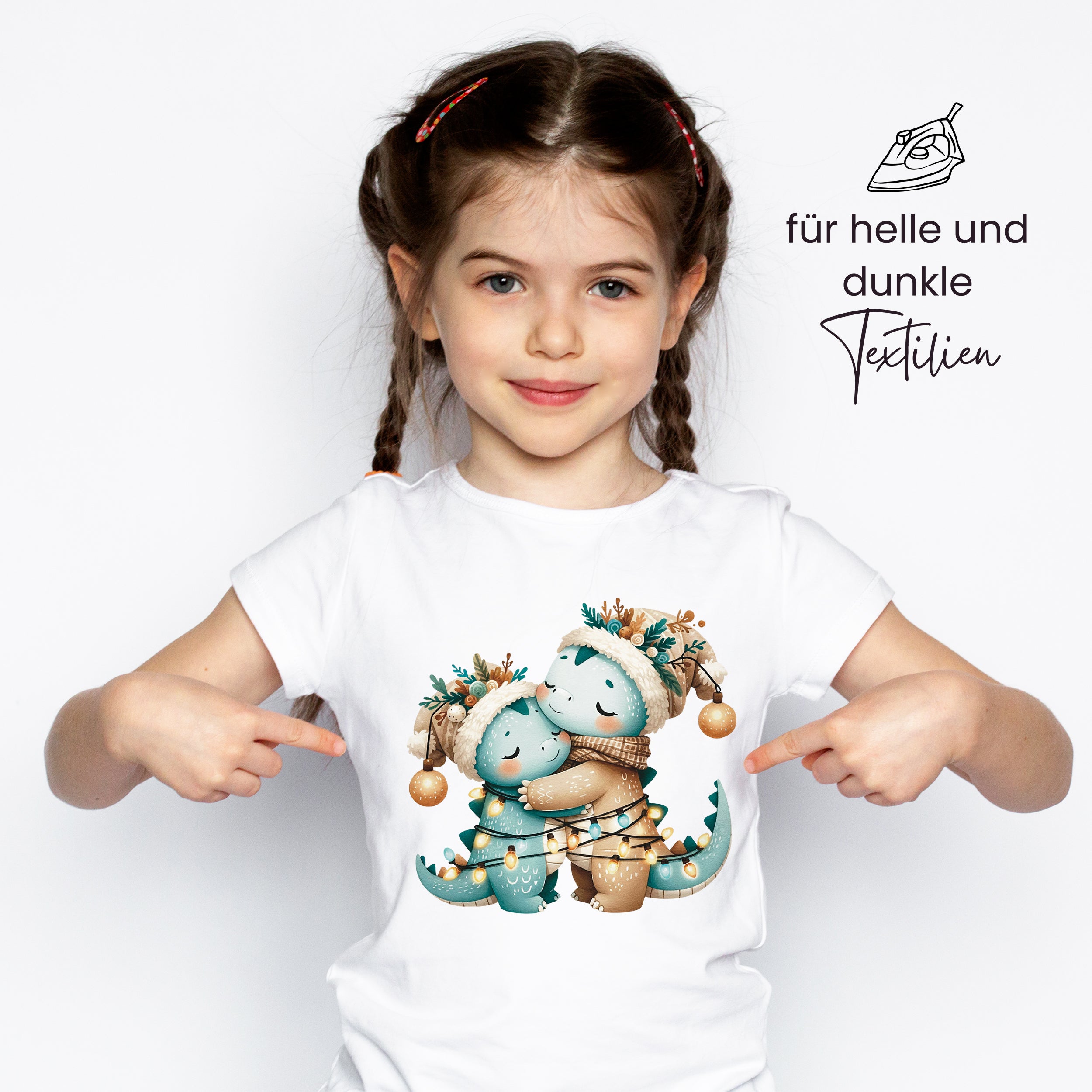 T-Shirt mit niedlichen Dinosauriern in Pastellfarben.