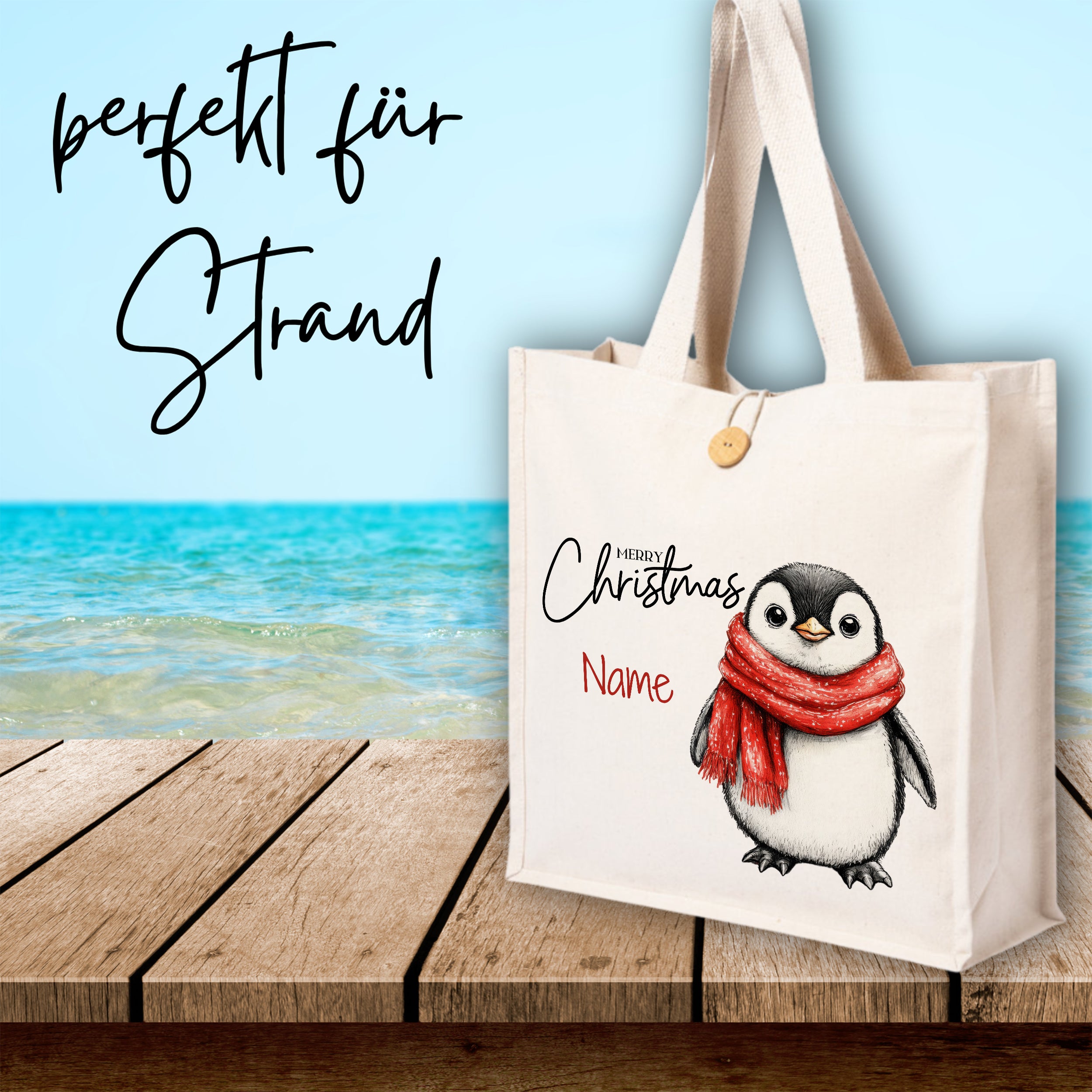 Stofftasche mit Pinguin-Motiv und rotem Schal.