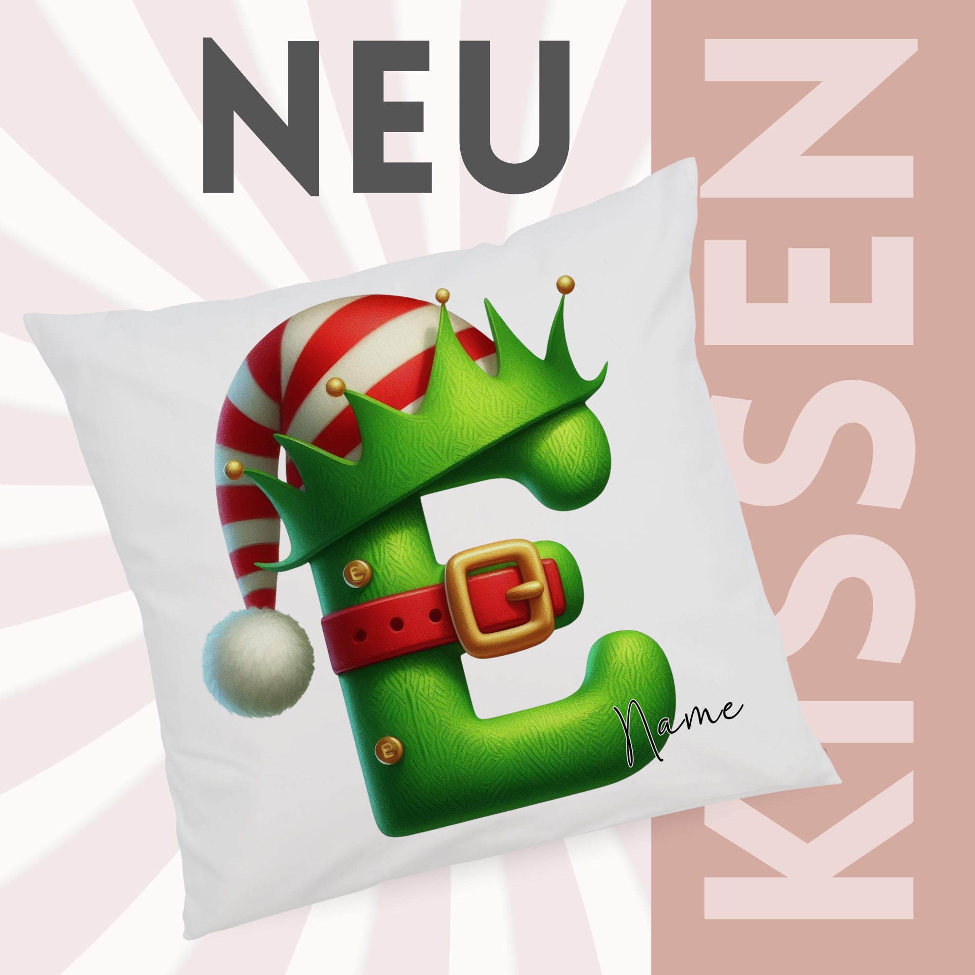Grünes Kissen mit Weihnachtsmotiv und Buchstabe E.