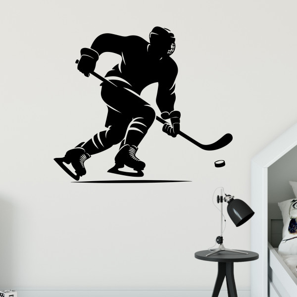 Wandtattoo Eishockey Spieler mit Puck